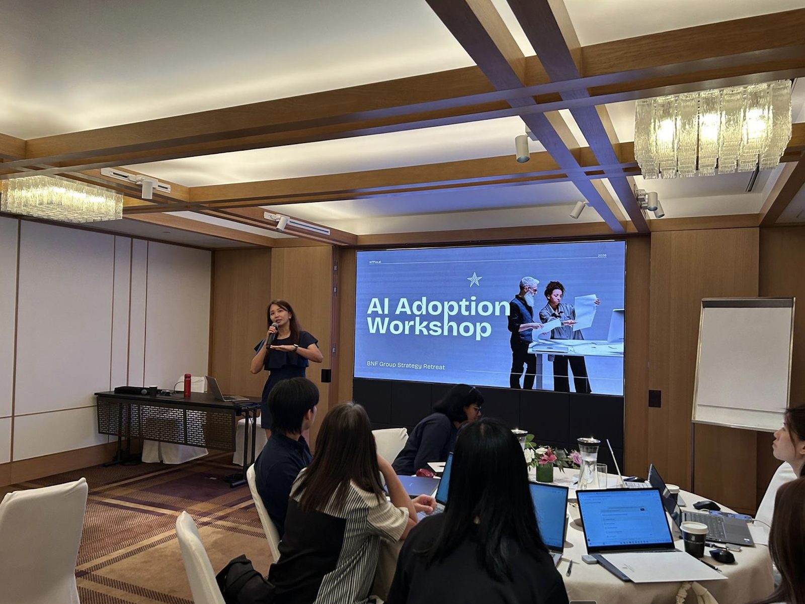 Geargina Tan delivering an AI Adoption Workshop at the BNF Group strategy retreat in Singapore, March 2026