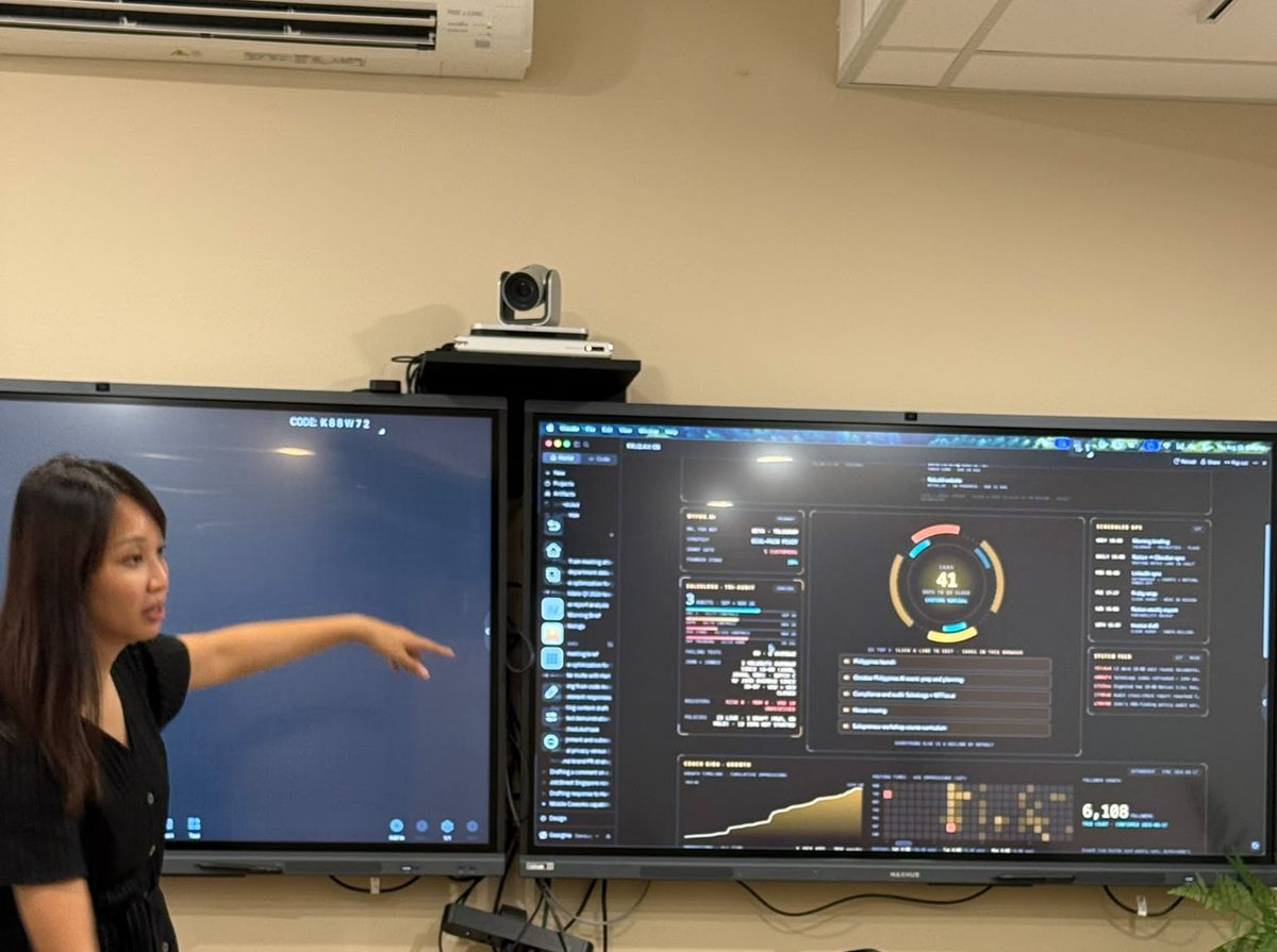 Geargina Tan demonstrating her Claude dashboard live during the Claude Masterclass in Singapore